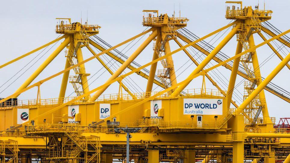 Business image related to Australia dock workers call for 28-hour week amid AI testing